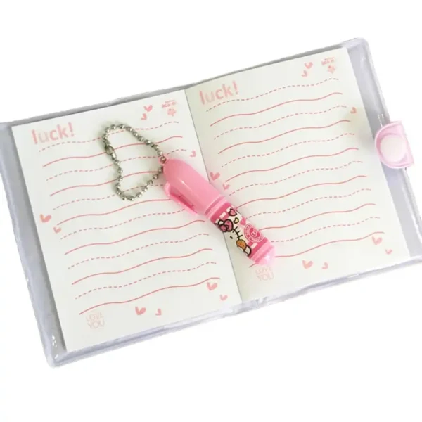 A notebook with a pen and a kitty design